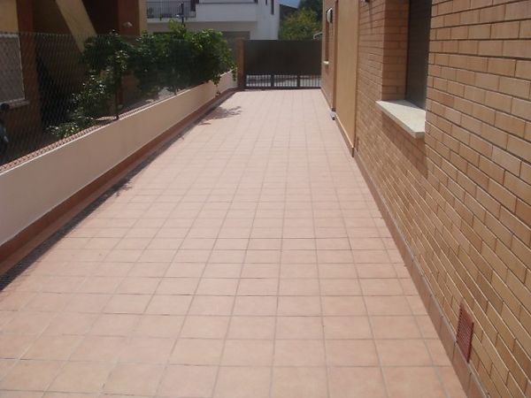 Apartment at the entrance of the village next to the playground
