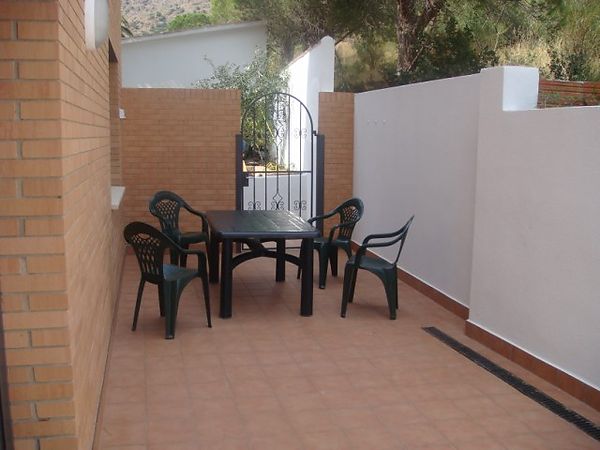 Apartment at the entrance of the village next to the playground