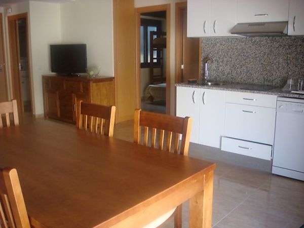 Apartment at the entrance of the village next to the playground