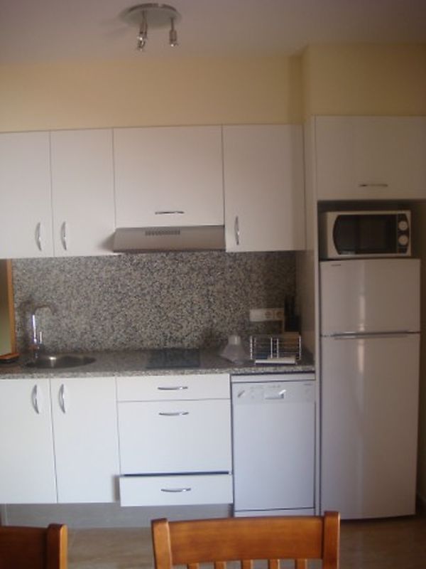 Apartment at the entrance of the village next to the playground