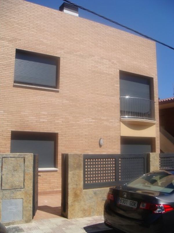 Apartment at the entrance of the village next to the playground